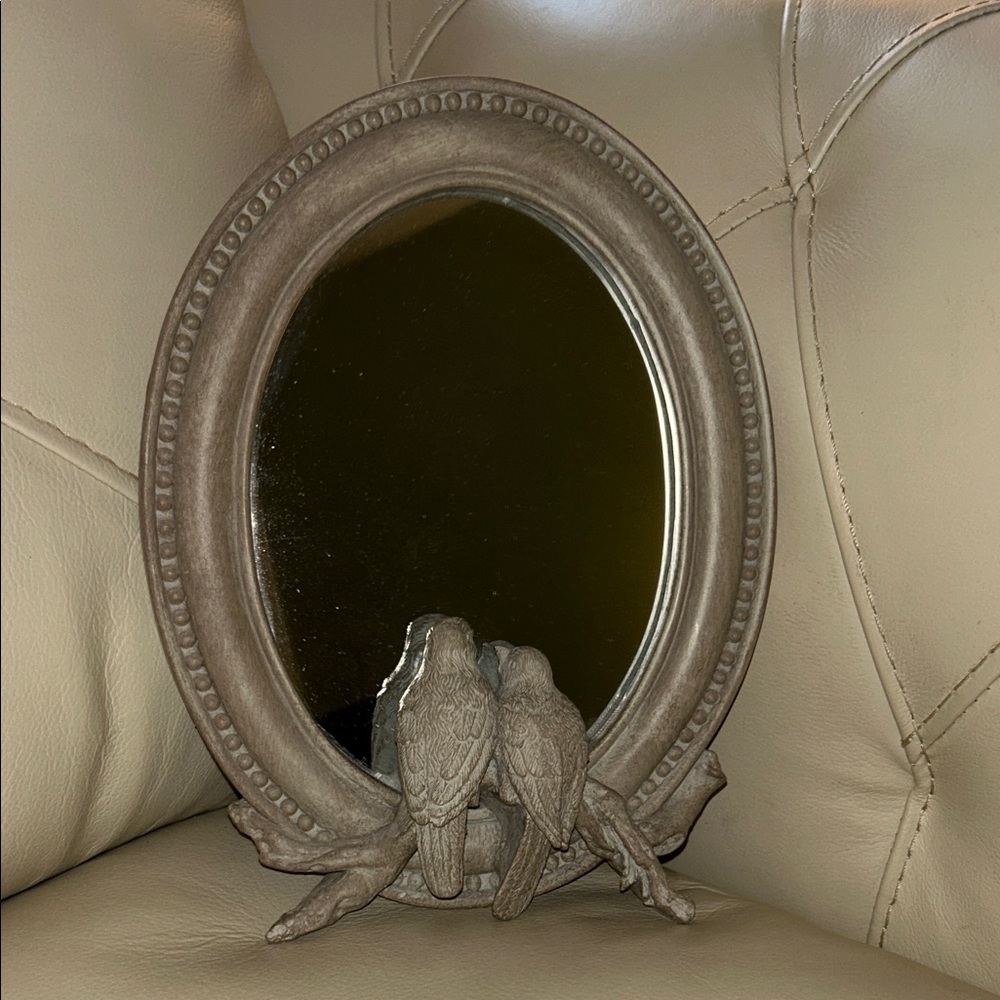 Elegant Brown Oval Mirror with Bird Design